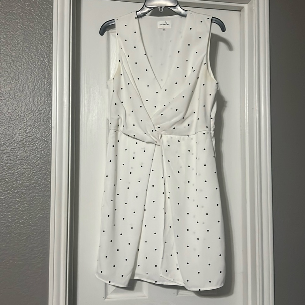 Sz M Sugar Lips white sleeveless dress with black polka dots